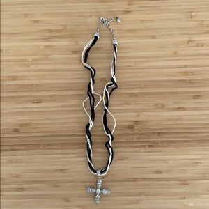 Silver cross pendant necklace on 2 tone rope